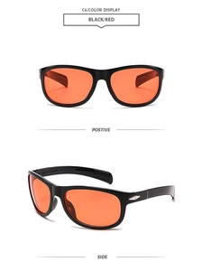 Detail view of sport sunglasses with black shiny frame and red-orange lenses