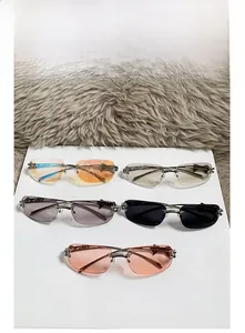 Collection of rimless star sunglasses in gradient orange, purple, and pink colors