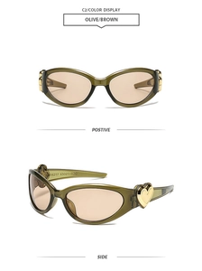 Close-up of olive resin sunglasses with gold heart detail and brown tinted lenses