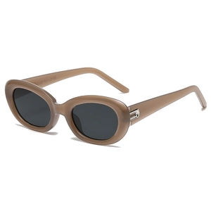 Retro oval tea-brown sunglasses with dark lenses and silver metal temple accents
