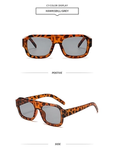 Detail view of Hawksbill tortoise shell square sunglasses with grey lenses and C7 color code