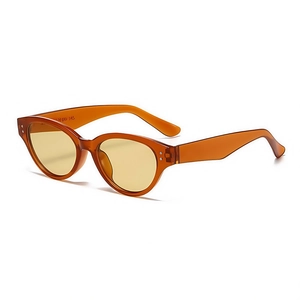 Retro cat-eye tortoiseshell sunglasses with orange frames and yellow tinted lenses
