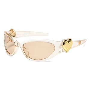 Fashionable champagne heart sunglasses with light brown lenses and gold hardware details