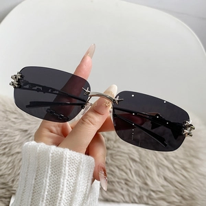 Y2K frameless rectangular sunglasses with silver metal stars and dark grey lenses