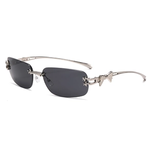 Frameless star sunglasses with silver bow detail and gray lenses for women's fashion
