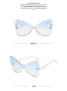 Detail view of butterfly sunglasses in transparent double blue frame and gradient lenses