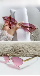 Detail of gold metal temples with triangle rivet texture on grey pink cat eye sunglasses