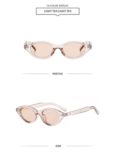 Detail view of vintage oval sunglasses in light tea color with decorative metal rivets