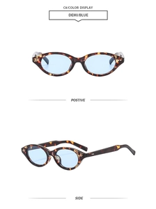Detail view of oval demi tortoiseshell sunglasses with light blue transparent lenses