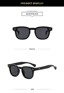 Detail view of black square sunglasses featuring silver arrow metal rivets and glossy finish