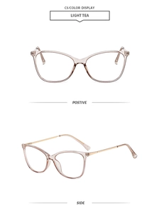 Detail view showing Light Tea butterfly frames with elegant gold metal temples and clear tips