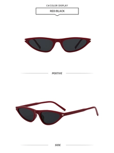 Front and side views of vintage deep red cat eye sunglasses with black lenses and silver accents