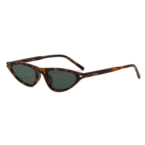 Retro tortoise shell cat-eye sunglasses with dark green lenses and silver rivets