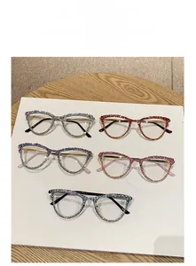 Detailed flat lay of vintage cat eye glasses frames with sparkling rhinestone accents
