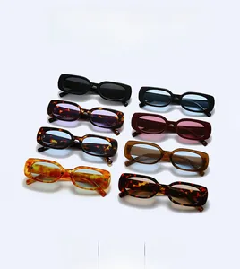 Flat lay of retro square sunglasses in eight stylish color combinations and lens tints