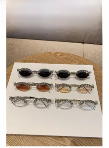 Selection of six diamond-encrusted oval sunglasses in various colors for stylish outfits