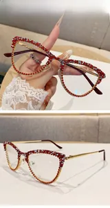 Detail of cat-eye frames with red and white rhinestones and golden metal temples