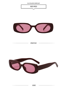 Detail view of retro square red sunglasses with front and side profile display