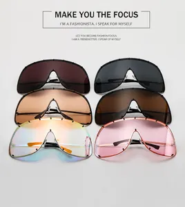 Detail view of large shield sunglasses showing rivet accents and diverse color selection