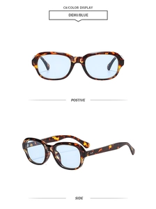 Detail of demi frames with blue lenses showing side metal dots and temple structure