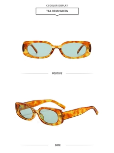 Detail view of tea demi rectangular frame sunglasses with green lenses from side and front