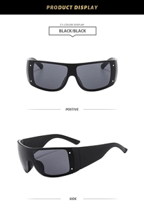 Detail views of black oversized shield sunglasses with silver accents and wide temples
