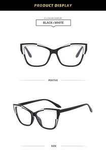 Detail view of stylish cat-eye glasses frame with modern black and white color blocking