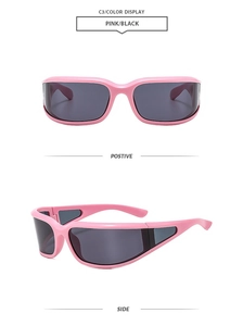 Détail de lunettes de soleil cyberpunk roses avec verres gris et découpes latérales