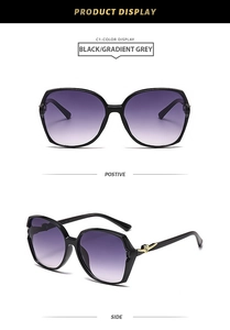Detail of square oversized sunglasses with black frames, gradient lenses and gold temple decor