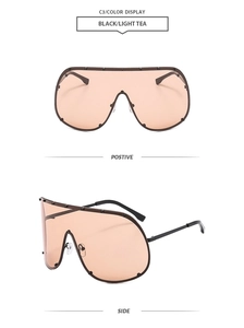 Front and side views of oversized shield sunglasses with rivets and light tea lenses
