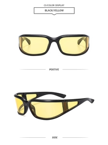 Détail de lunettes de soleil de sport enveloppantes à monture noire et verres jaunes
