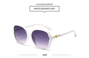 Detail of white square sunglasses with gradient lenses and gold temple accents