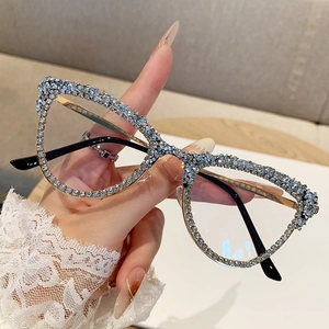 Chic cat eye glasses frame with heavy rhinestone embellishments and gold metal temples