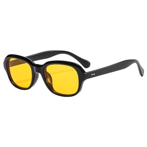 Fashionable black frame sunglasses with bright yellow lenses and silver rivets detail