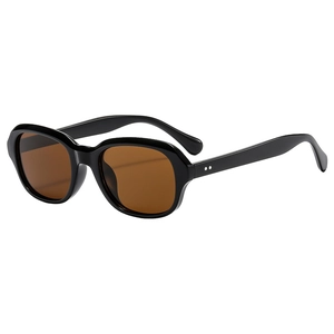 Retro thick black frame sunglasses with amber lenses and silver rivet detailing