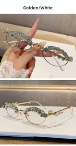 Detail of luxury gold oval sunglasses frame encrusted with sparkling blue rhinestones