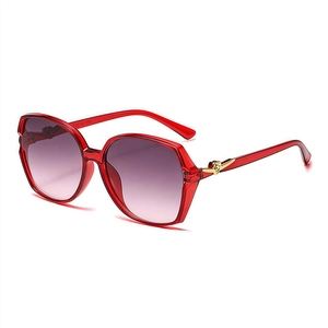 Classic red square oversized sunglasses with gradient lenses and gold rose detail