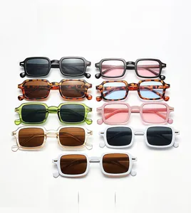Flat lay display of retro square sunglasses in nine assorted colors on a white background