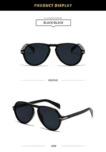 Classic black pilot sunglasses featuring deep gray polarized lenses and resin frames