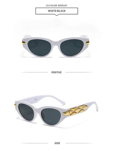 Detail of white cat eye sunglasses featuring gold woven texture metal hinges and dark lenses