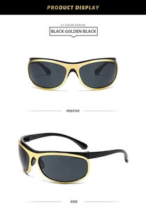 Détails des lunettes punk futuristes avec monture noire et finitions métalliques dorées