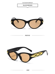 Detailed view of black cat eye sunglasses with golden geometric embossed temple decor