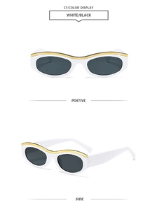 Detailed views of white oval cat-eye sunglasses with gold metal trim and grey lenses