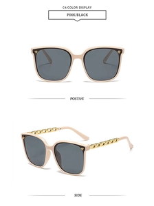 Detail of pink square sunglasses with gold chain temples and star rivets, side view