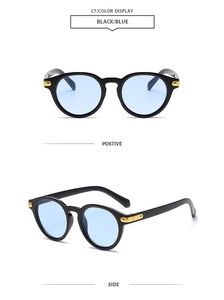 Classic retro round sunglasses in black with light blue lenses and gold rivet accents