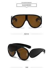 Detail of oversized black sunglasses with brown integrated lenses showing front and side views