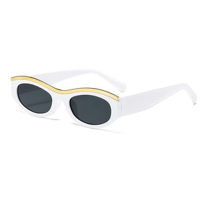 Retro white cat-eye sunglasses with gold metal wave accents and dark gray lenses