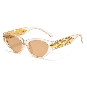 Fashionable champagne cat eye sunglasses with gold geometric details on temple
