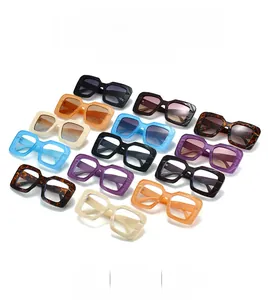 Collection of oversized square sunglasses in multiple colors arranged in a grid