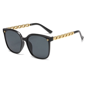 Fashionable oversized square black sunglasses with gold chain temples and star rivets